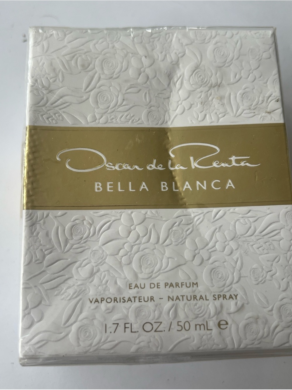 Oscar de la Renta White and Clear Perfume Packaging with Gold Script